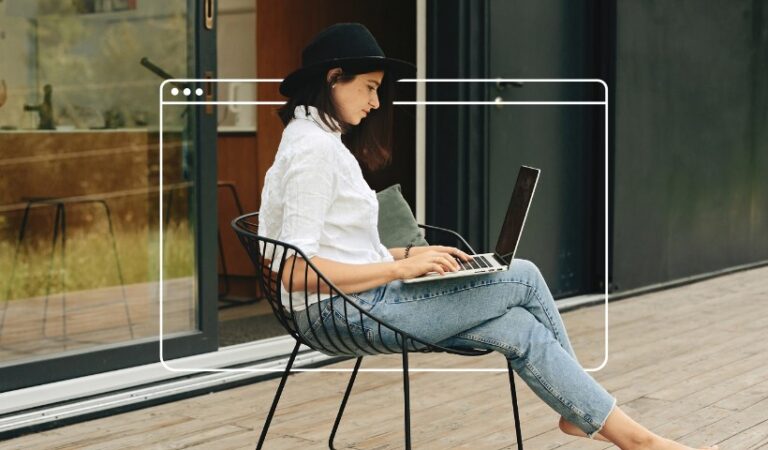 Woman working on laptop outdoors, representing how Fiverr works for freelancers and buyers