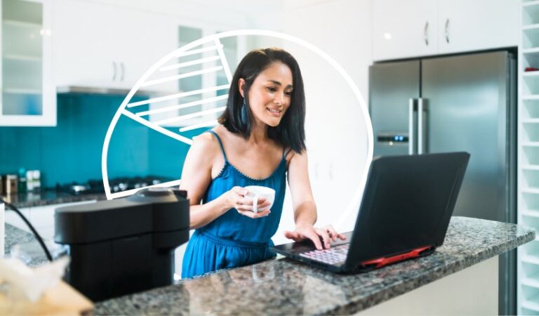 Woman checking Shopify store costs on a laptop at home