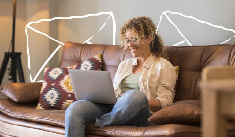 Person checking email newsletter at home best time to send a newsletter.