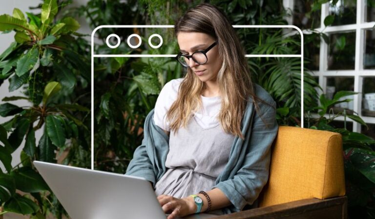 Woman deciding if Shopify is worth it while setting up an online store on a laptop