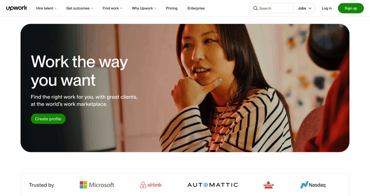 Upwork homepage hero with woman and "Work the way you want" text